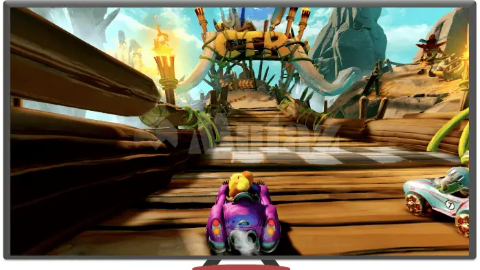 لحظة مثيرة في لعبة Crash Team Racing، حيث تظهر سيارات الكارت المسرعة حول مسار متعرج مليء بالعناصر المعززة والمخاطر